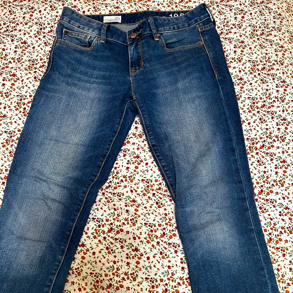 Dark Blue skinny jeans, ankle length. Size 27s, originally from Gap.